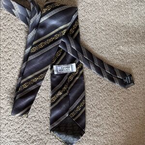 Versace Elegant Black and Gold Striped Tie